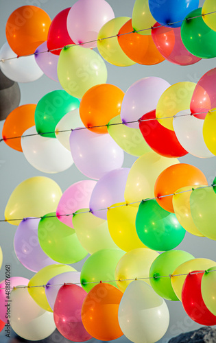 Colorful balloons wall for party and carnival. many colored balloons forming a bright background wallpaper image.