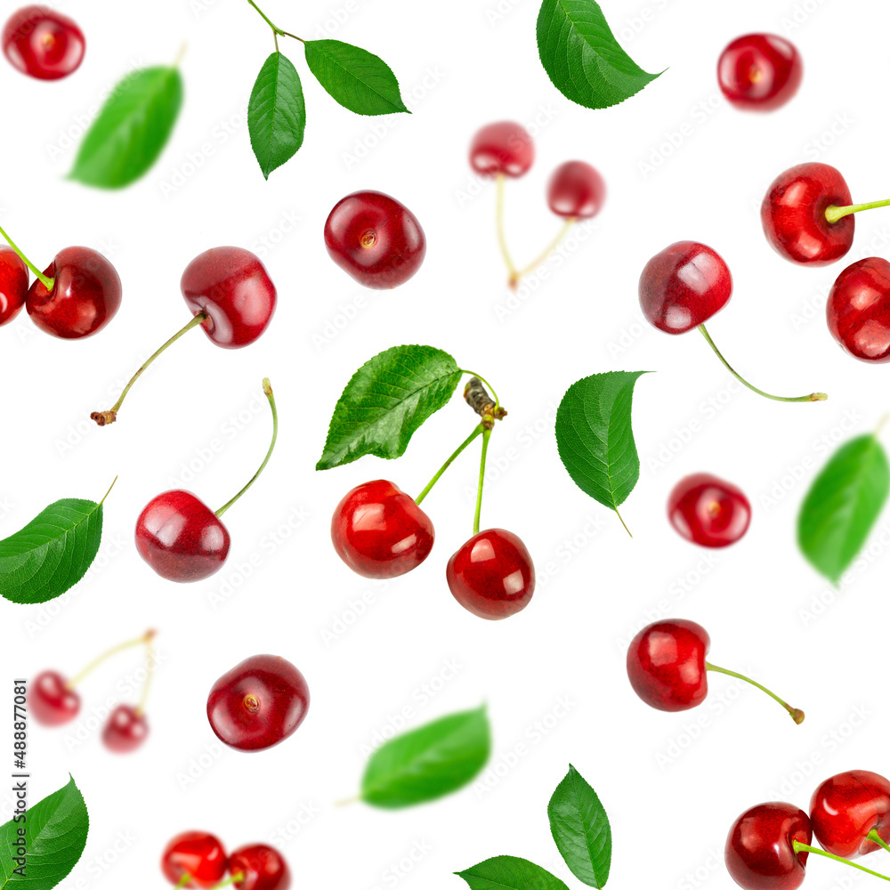 Background of cherry berries and green leaves on a white background. Background of cherry berries and green leaves on a white background.