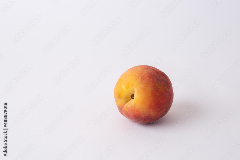 fresh peach on a white meza fresh peach on a white meza