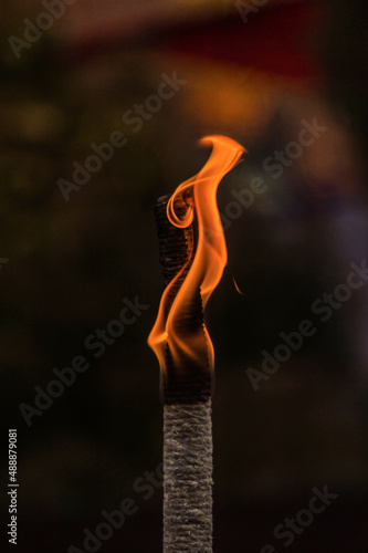 orange fire torches on light blue background © fransuarez