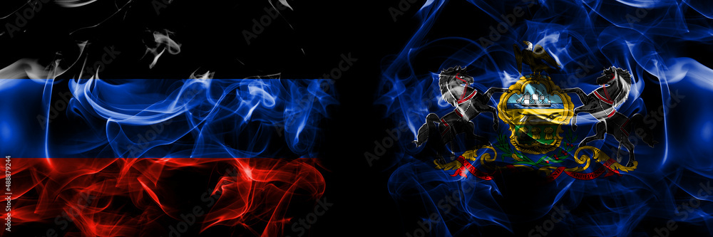 Donetsk People's Republic vs United States of America, America, US, USA, American, Pennsylvania flag. Smoke flags placed side by side isolated on black background.