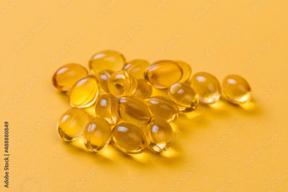 Close up of oil filled capsules suitable for: fish oil, omega 3, omega 6, omega 9, vitamin A, vitamin D, vitamin D3, vitamin E - Image Close up of oil filled capsules suitable for: fish oil, omega 3, omega 6, omega 9, vitamin A, vitamin D, vitamin D3, vitamin E - Image