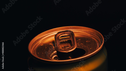 beer can on black background
