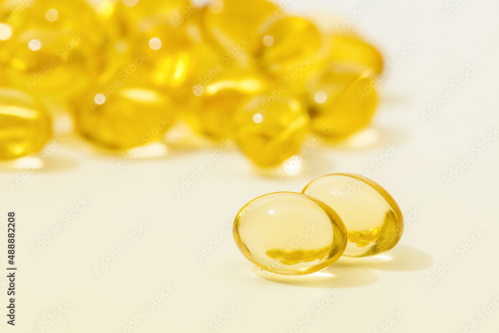 Close up of oil filled capsules suitable for: fish oil, omega 3, omega 6, omega 9, vitamin A, vitamin D, vitamin D3, vitamin E - Image Close up of oil filled capsules suitable for: fish oil, omega 3, omega 6, omega 9, vitamin A, vitamin D, vitamin D3, vitamin E - Image