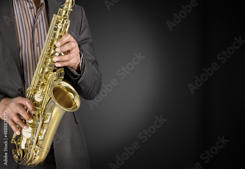 Musician playing jazz music instrument. Band instruments