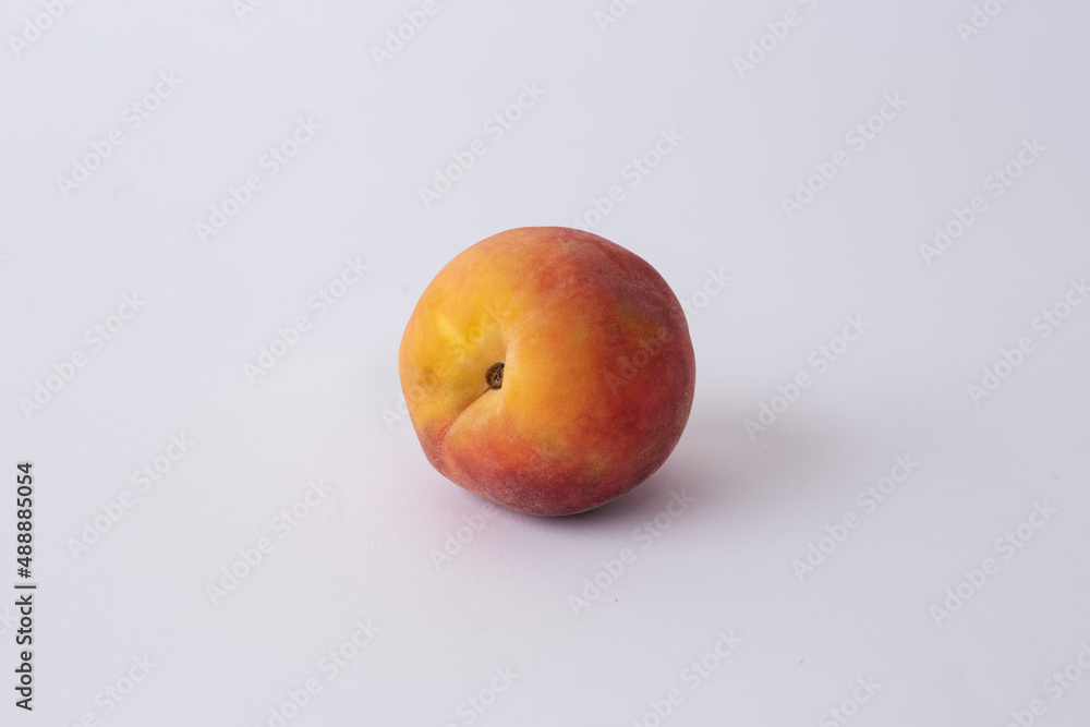 fresh peach on a white meza fresh peach on a white meza
