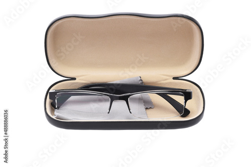 A pair of eye glasses in a hard case with microfiber cloth.