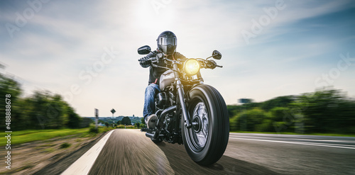 motorbike on the road riding. having fun driving the empty highway on a motorcycle tour journey