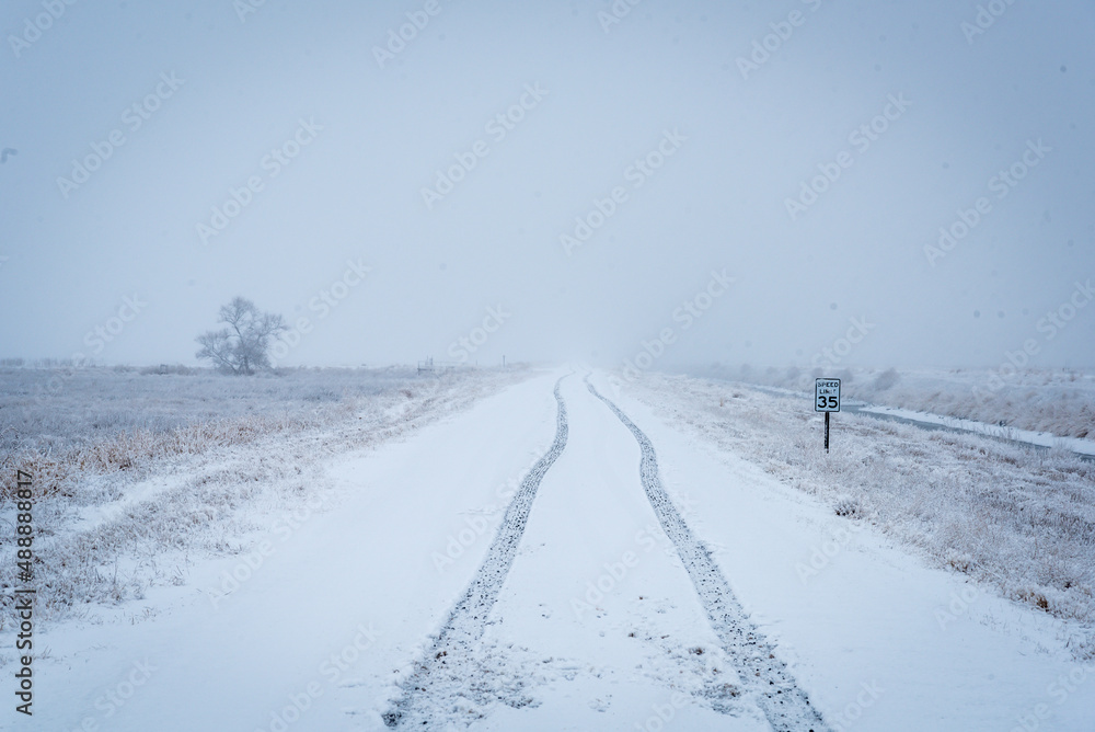 Fototapeta premium cascade mountain roadway in winter with snow and ice
