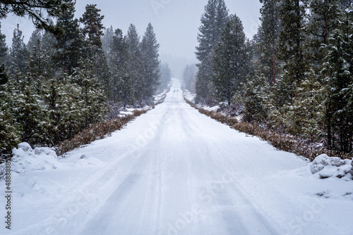 cascade mountain roadway in winter with snow and ice