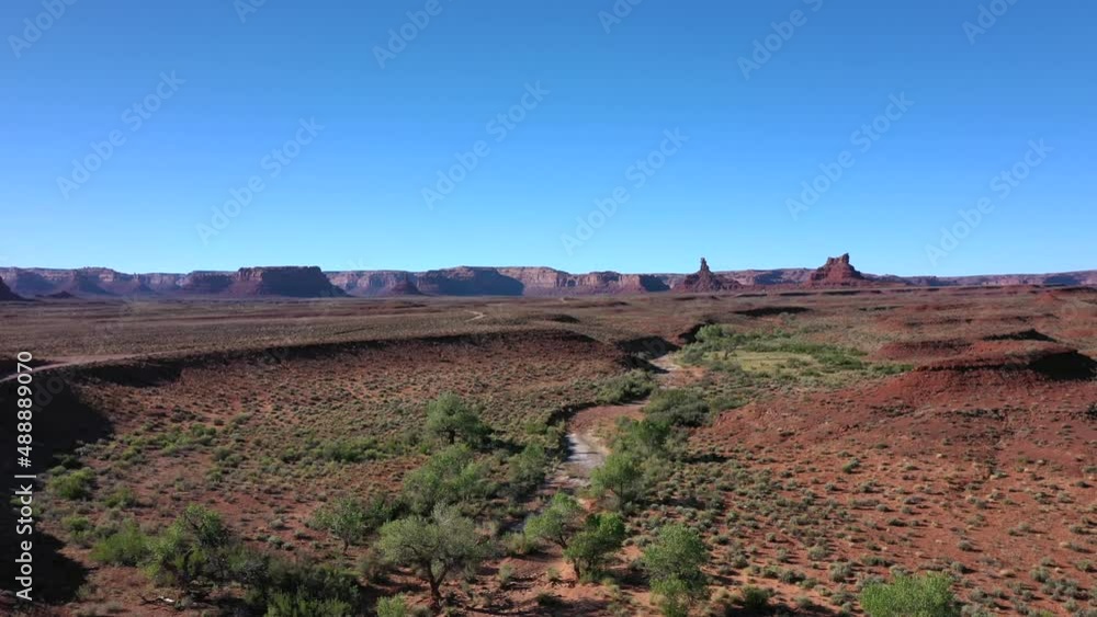 Barren Landscape With Vermilion Cliffs At Background In Arizona Near Utah, United States. Wide Shot Barren Landscape With Vermilion Cliffs At Background In Arizona Near Utah, United States. Wide Shot