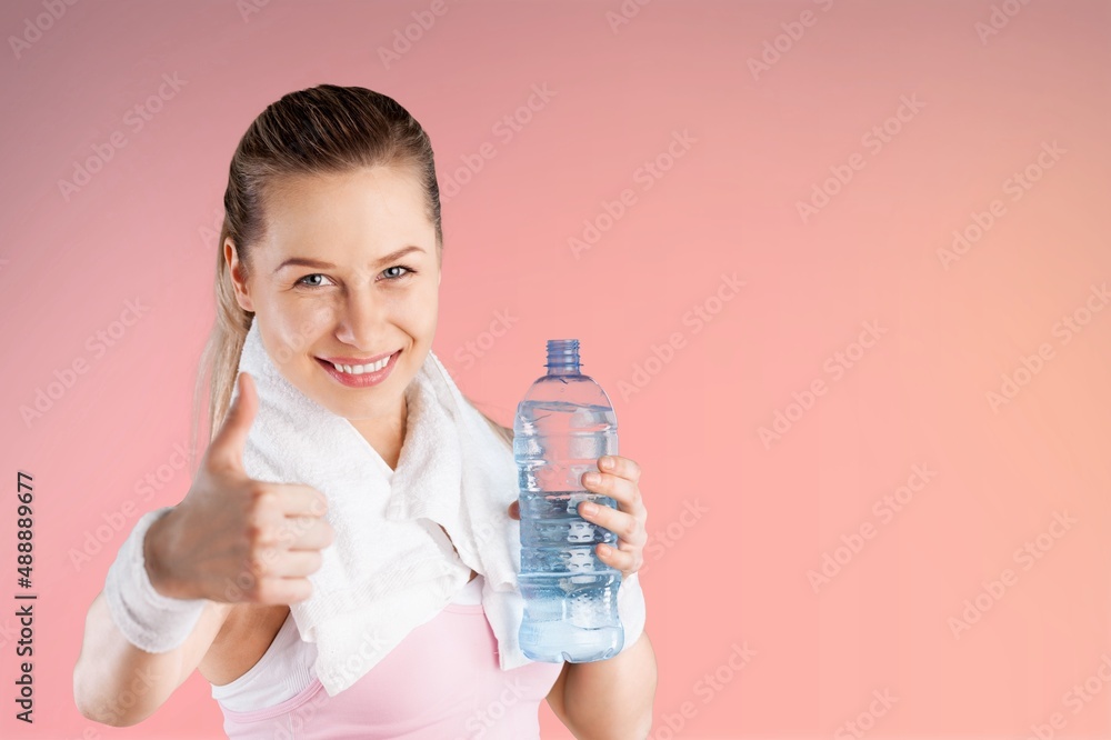Young happy strong sporty fitness trainer instructor woman. Workout sport concept Young happy strong sporty fitness trainer instructor woman. Workout sport concept