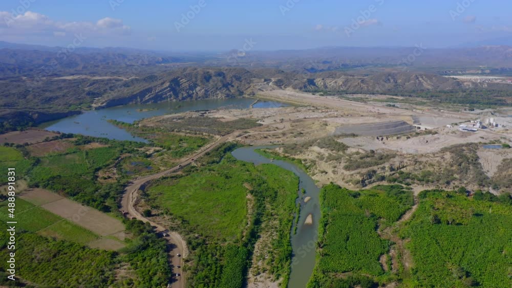 Yaque del Sur River Near Monte Grande Dam Construction Site In Barahona, Dominican Republic. aerial drone Yaque del Sur River Near Monte Grande Dam Construction Site In Barahona, Dominican Republic. aerial drone