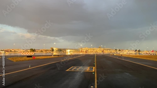 Taxi in to Valencia airport after a storm with a nice yellow light photo