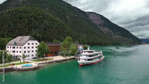 I take some aerial shots with my quadcoper in 4K from a boat at Achensee at the austria mountains photo