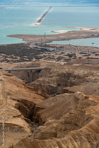 View of the desert mountains and the Dead Sea from an official viewpoint above the Dead Sea in Israel. 