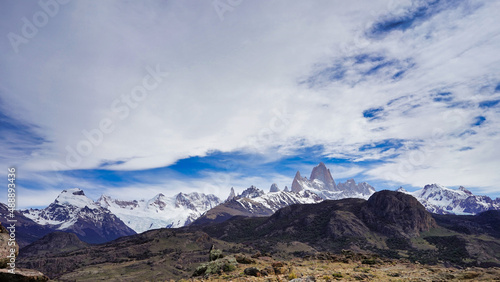 Panoramic view of Fitz Roy with snow and the town of El Chaltén