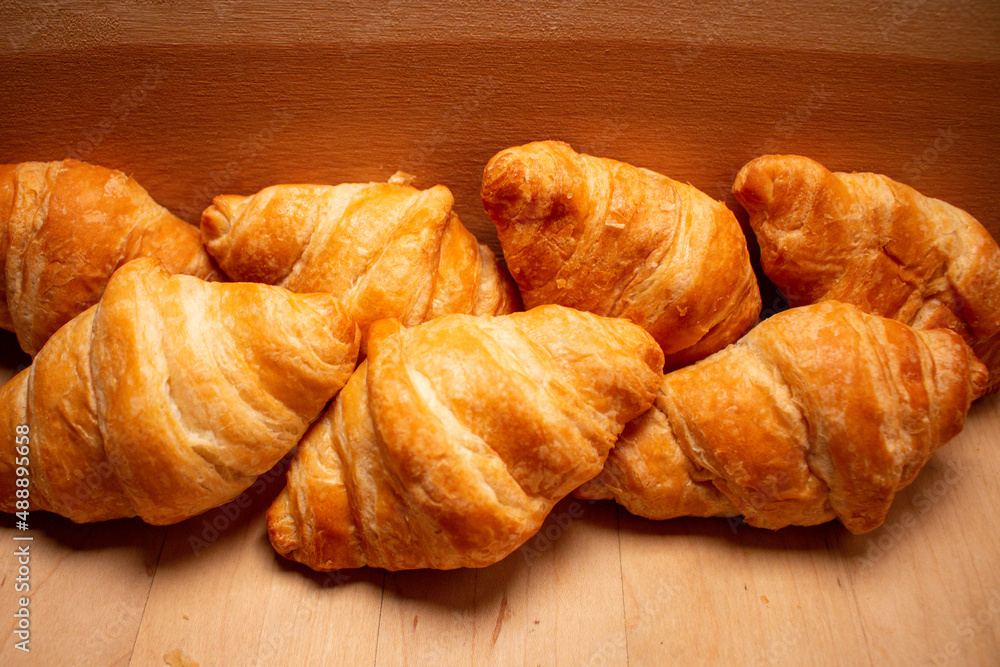 fresh baked pastry rolls butter crescent shape bakery roll breakfast snack food display