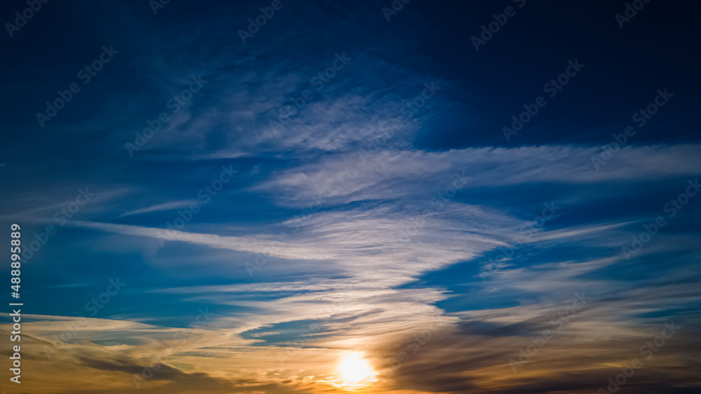 Vibrant beautiful winter sunset with angelic clouds Vibrant beautiful winter sunset with angelic clouds