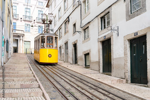 Yellow typical Bica elevator in Lisbon, Portugal.