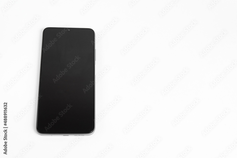 New cell phone over white background New cell phone over white background