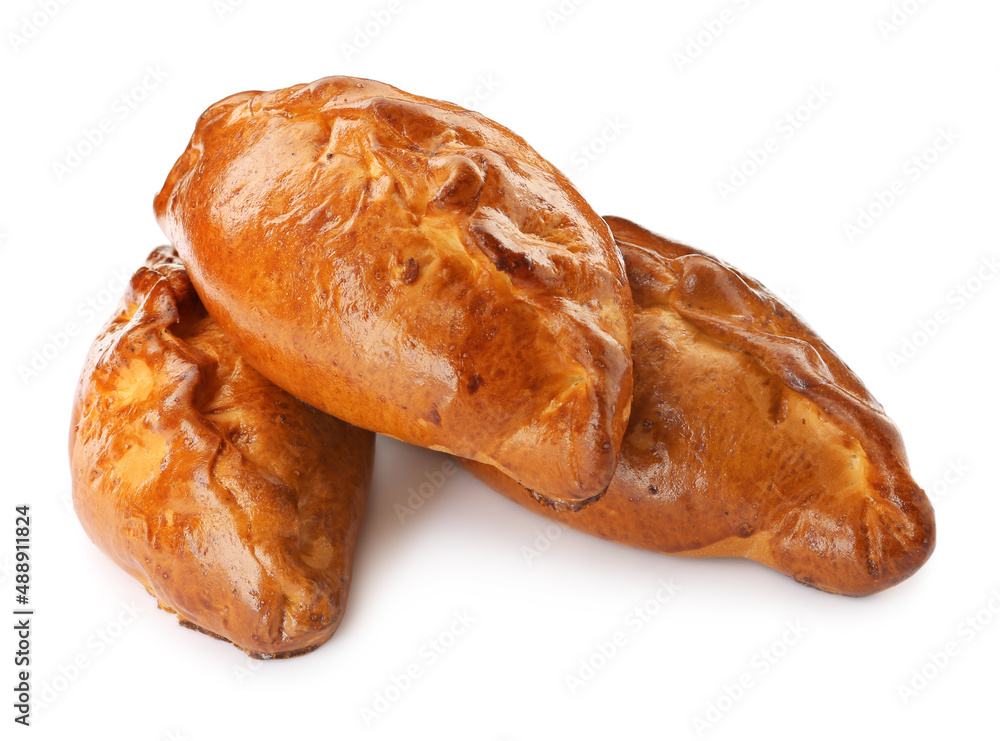 Many delicious baked patties on white background Many delicious baked patties on white background