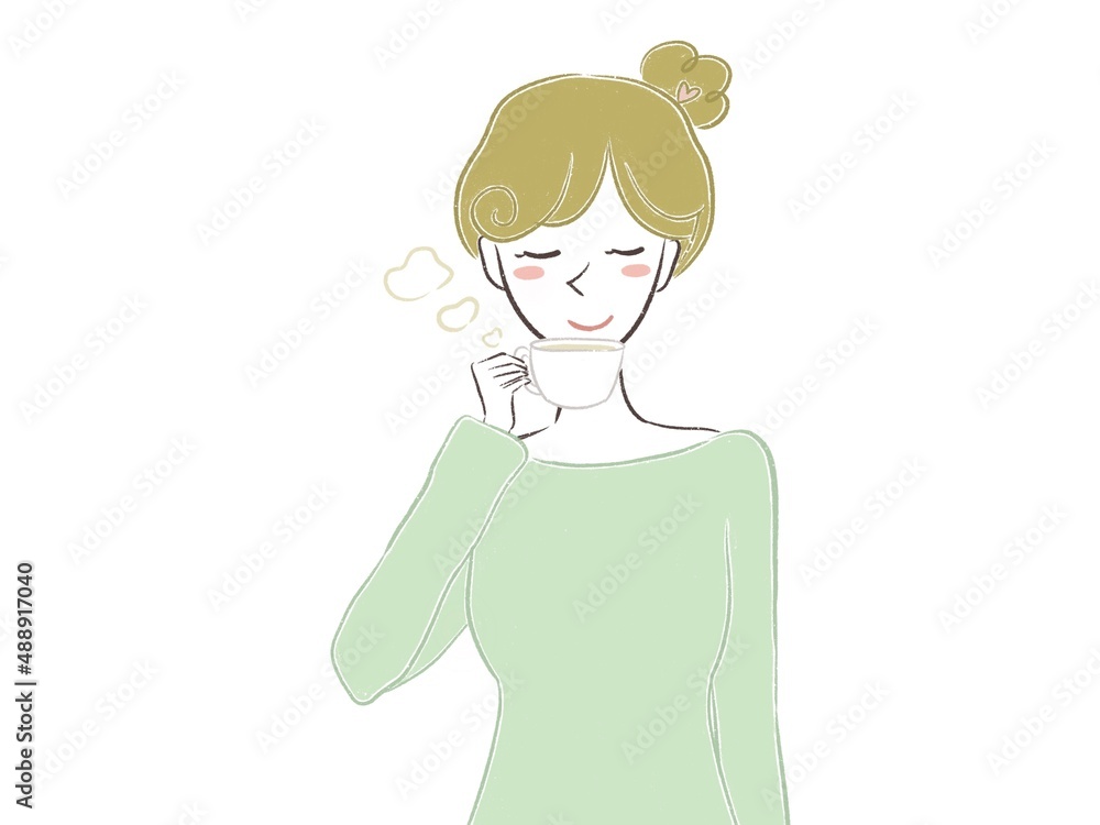 ハーブティーを飲んでリラックスする女性 ハーブティーを飲んでリラックスする女性