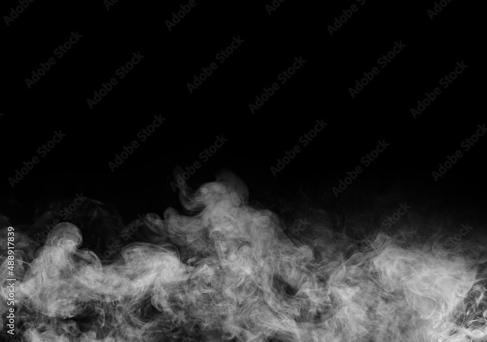 Smoke over black background. Fog or steam texture. Smoke over black background. Fog or steam texture.