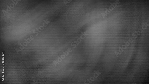 Dirty blackboard background. Abstract black background with scratches. Vintage grunge background texture elegant monochrome background design. Grungy textured blackboard.