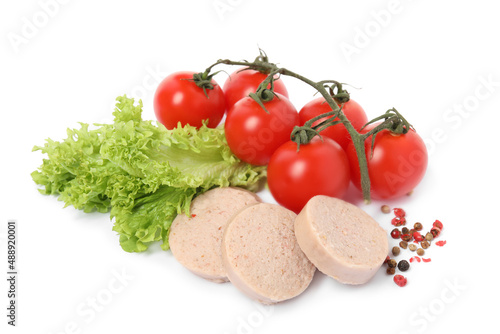 Slices of delicious liver sausage, tomatoes, lettuce and peppercorns on white background