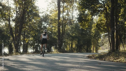 Wallpaper Mural cyclist girl training. Cyclist Woman in Helmet on Bike Torontodigital.ca