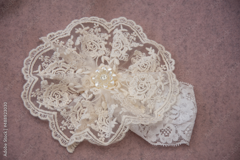 Obraz premium Baby christening cream lace ribbon 