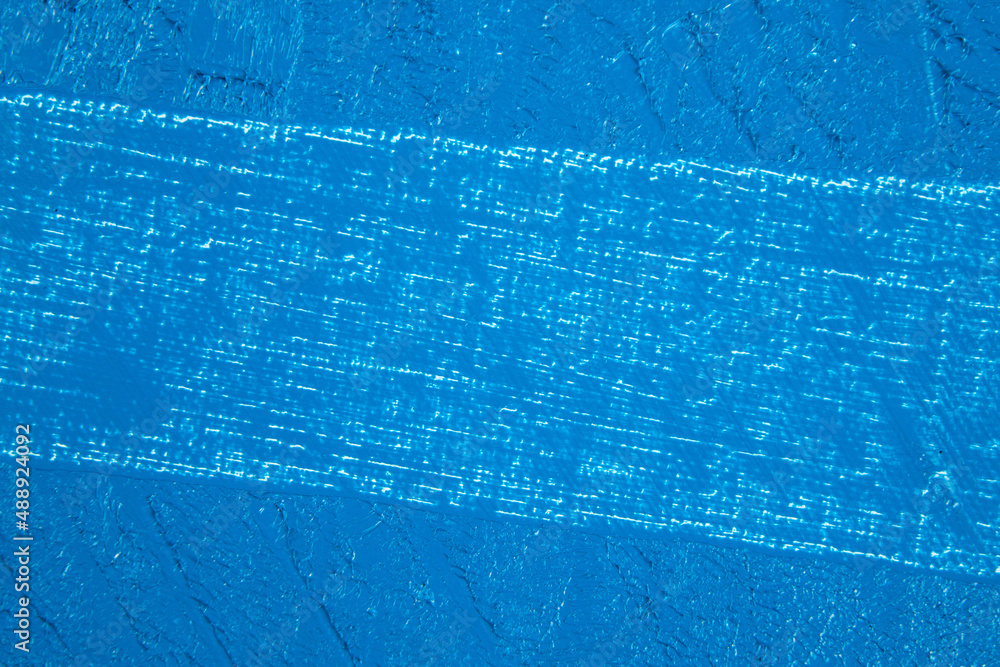 deep blue abstract background, applied toning primer on a white surface deep blue abstract background, applied toning primer on a white surface