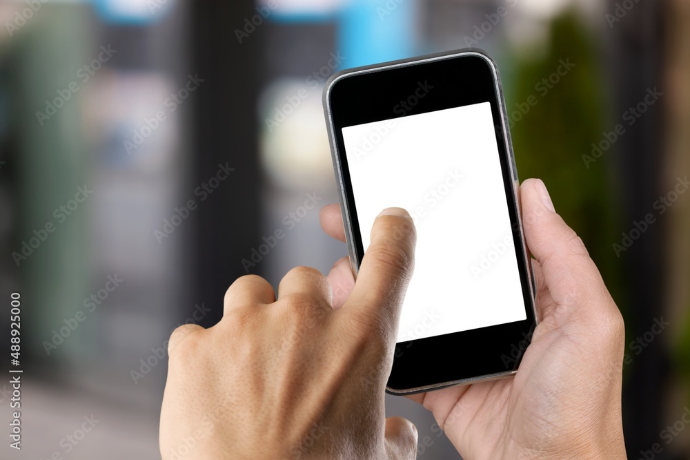 Human hands showing smartphone against background. Human hands showing smartphone against background.