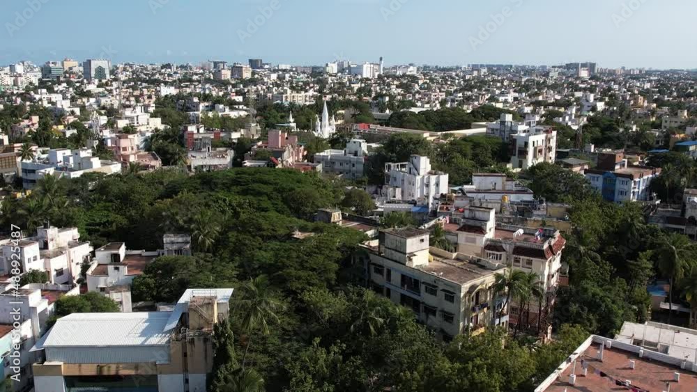Aerial Drone Shot Of Building And Trees In The City Of Chennai. Chennai, on the Bay of Bengal in eastern India, is the capital of the state of Tamil Nadu. Aerial Drone Shot Of Building And Trees In The City Of Chennai. Chennai, on the Bay of Bengal in eastern India, is the capital of the state of Tamil Nadu.