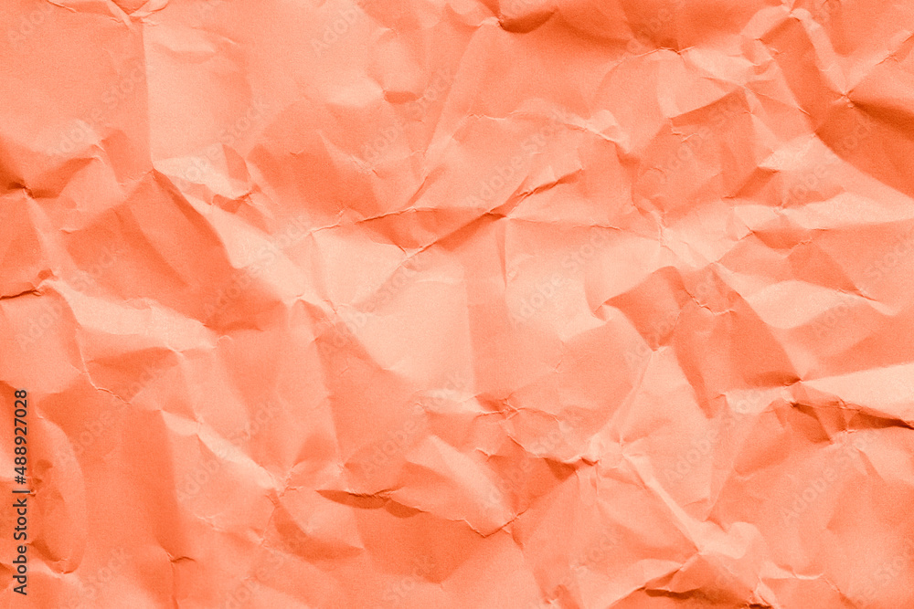 Crumpled orange paper texture. Crumpled orange paper texture.