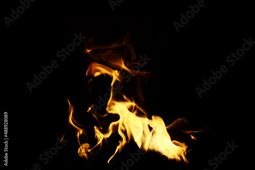 Background of the flame in the oven. Overlay layer. Tongues of fire in a brick fireplace. © alexkich
