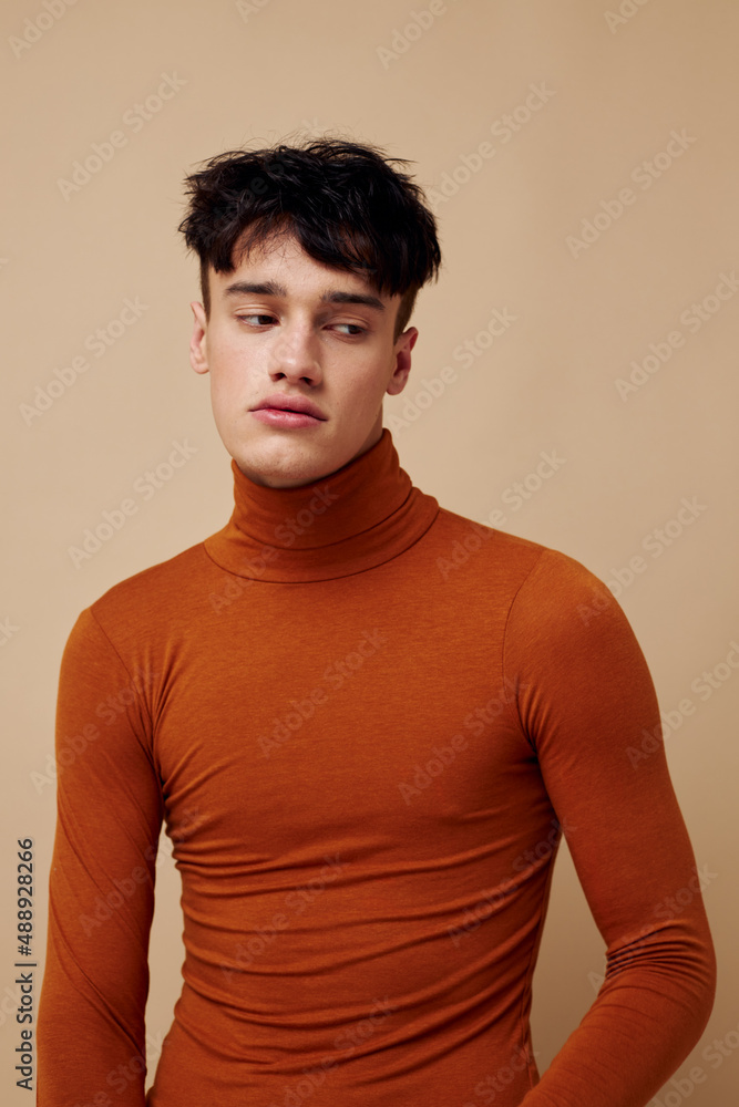 handsome guy fashionable clothes posing studio modern style isolated background unaltered handsome guy fashionable clothes posing studio modern style isolated background unaltered