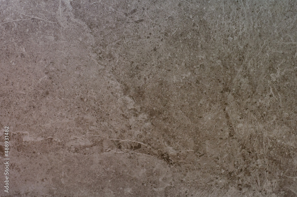 Texture of brown plain marble slab, porcelain stoneware from Spain. Abstract minerals background Texture of brown plain marble slab, porcelain stoneware from Spain. Abstract minerals background