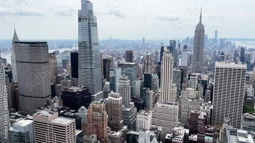New York aerial view of Midtown Manhattan with skyscrapers Empire State Building and Chrysler Building from Rockefeller Center Top of The Rocks observation deck