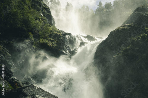 Fototapeta Naklejka Na Ścianę i Meble -  A flowing waterfall in Norway