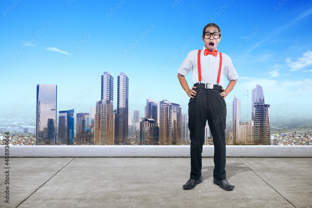 Asian nerd with ugly face standing Asian nerd with ugly face standing