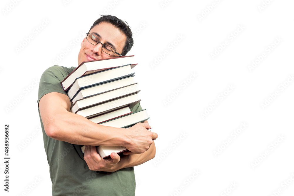 Male bookworm embracing stack of good books Male bookworm embracing stack of good books