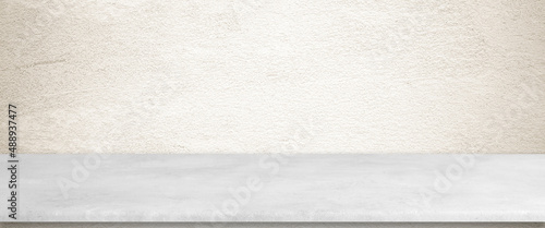 Empty white cement table over brown cement concrete wall background, banner, table top, shelf, counter design for product display montage
