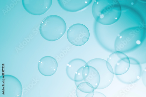 Beautiful Transparent ฺBlue Soap Bubbles Texture Background.   © Siwakorn1933