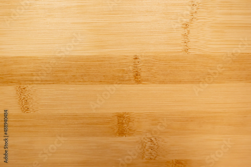 Bamboo wooden background with horizontal lines of a narural wood plank texture photo