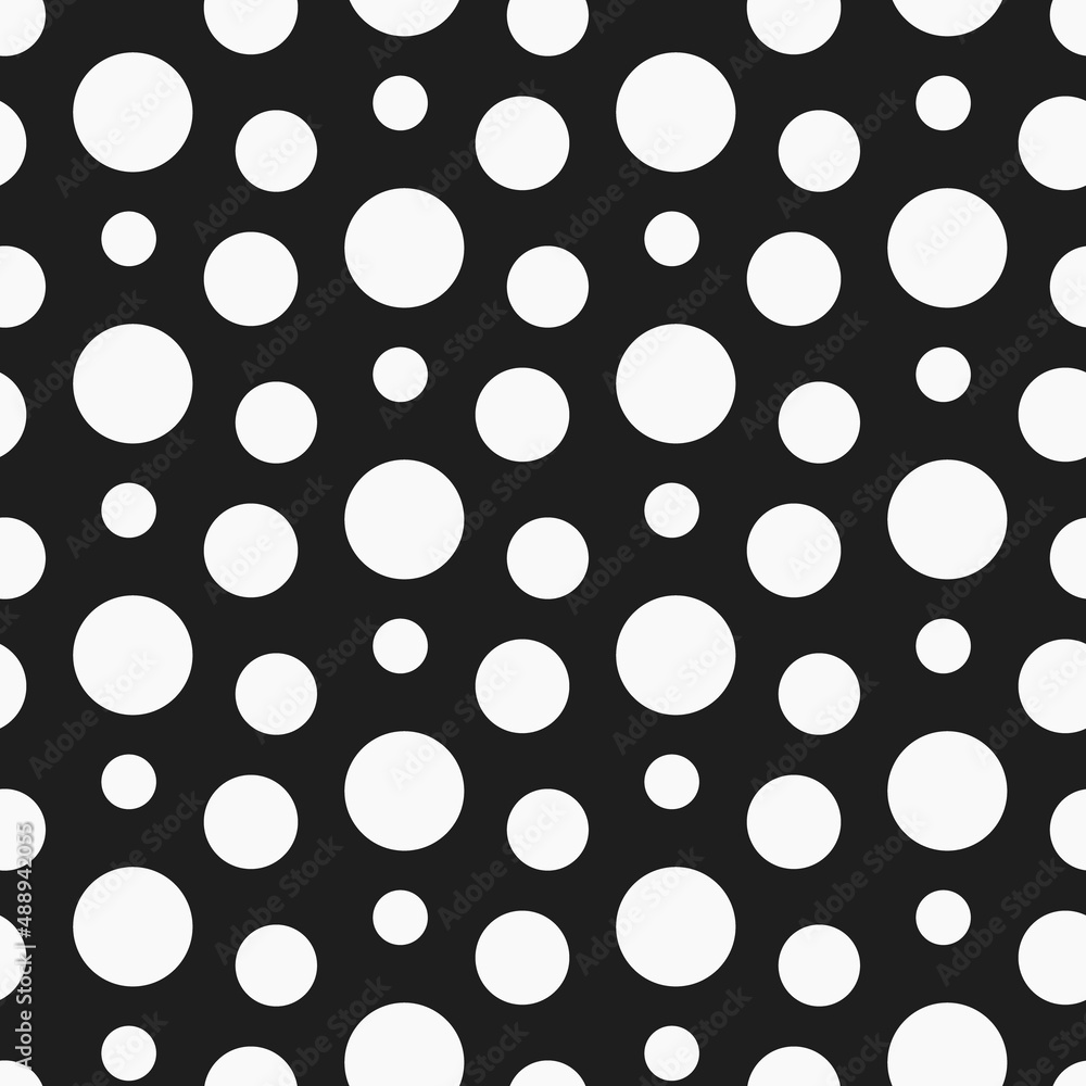 Abstract white circles on black background seamless pattern.  Best for textile, wrapping paper, package and home decoration.