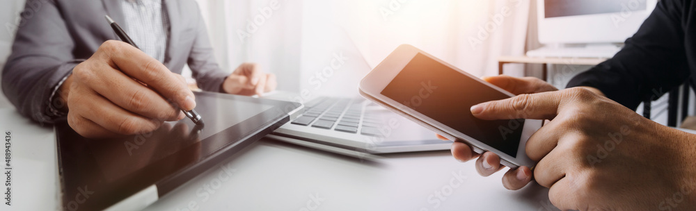 man using digital tablet computer, close up of the hand, business and technology background with copy space man using digital tablet computer, close up of the hand, business and technology background with copy space