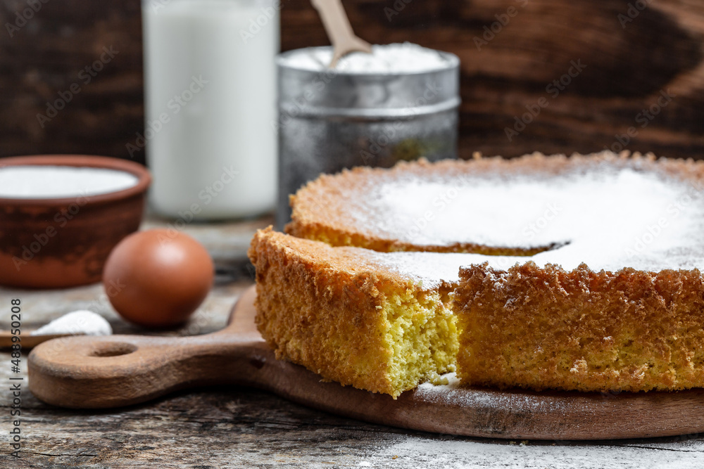 Homemade sponge cake with ingredients eggs. flour milk and sugar, Bakery background concept. banner, menu recipe place for text Homemade sponge cake with ingredients eggs. flour milk and sugar, Bakery background concept. banner, menu recipe place for text