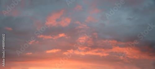 dreamy sunset scenery, grey and blue sky with pink lighted clouds © SusaZoom